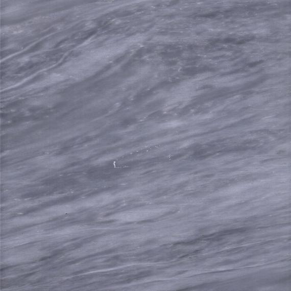 Azulejos de mármol gris, blanco y beige para interiores de edificios.